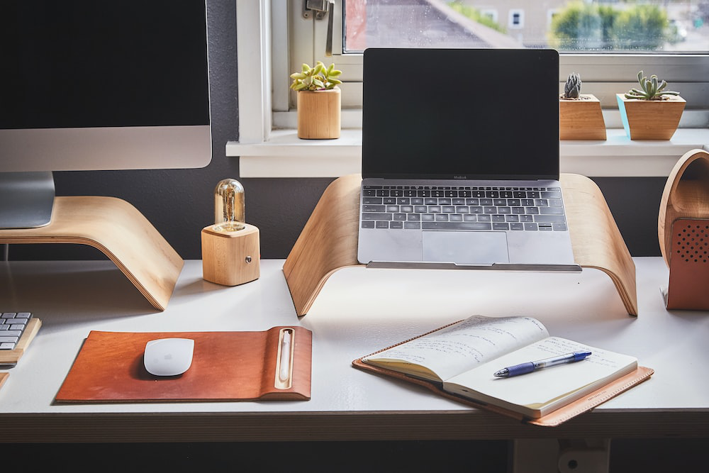 A home office desk by a window