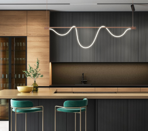 A modern kitchen with a bar and stools