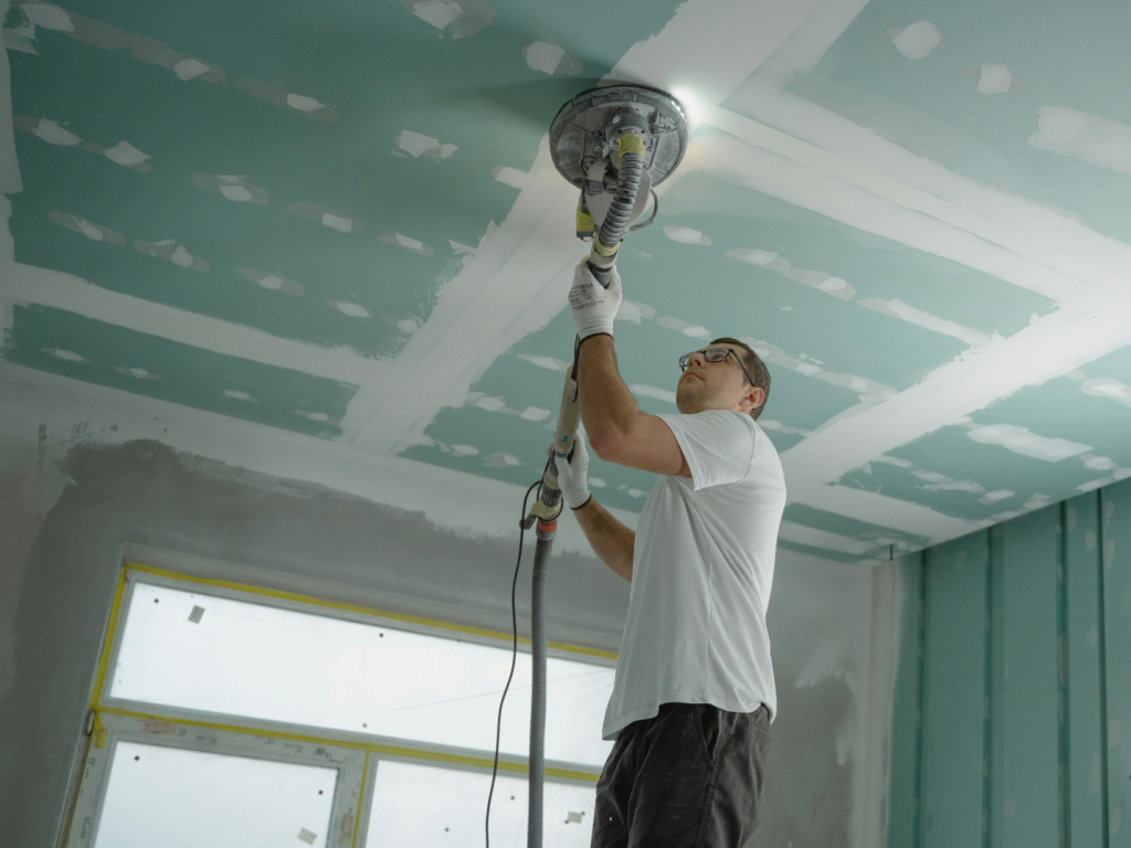 A man polishing the roof