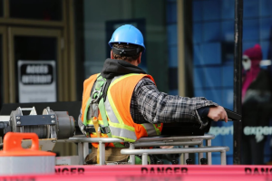 An image of a man wearing a blue helmet