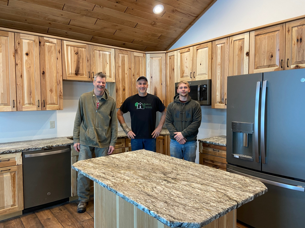 Modern Interiors owner with a client in a newly renovated kitchen in Rhinelander, WI.