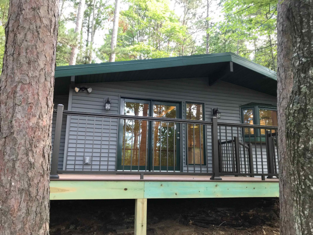 A cozy custom-built cabin in Rhinelander, Wisconsin, surrounded by scenic Northwood landscapes.